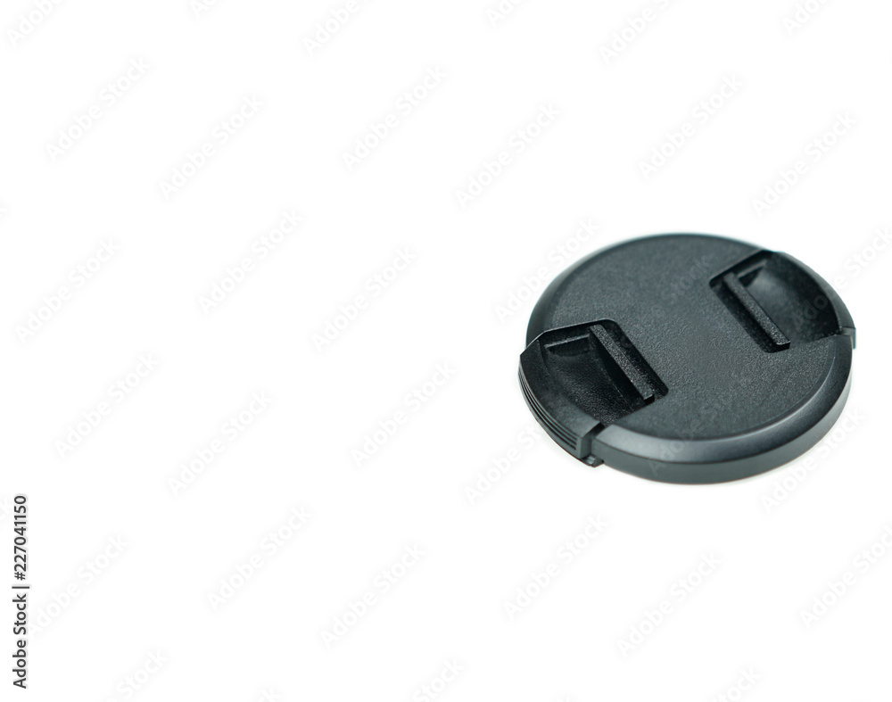 Black cover for protect lens of camera with copy space on isolated white Black cover for protect lens of camera with copy space on isolated white