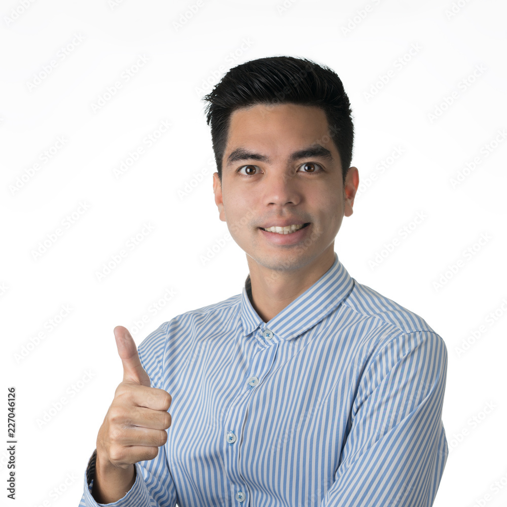 Portrait handsome young asian man wearing a blue shirt thumbs up sign isolated on white background. Asian man people. Portrait handsome young asian man wearing a blue shirt thumbs up sign isolated on white background. Asian man people.