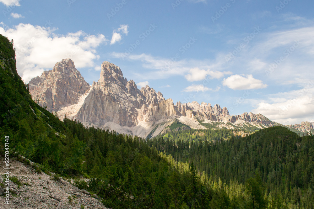 Landscape view from an excursion trail in the Dolomites mountains. This mountain range is part of the Italian Alps and is a really unique sight because of the particular kind of stone it is made of