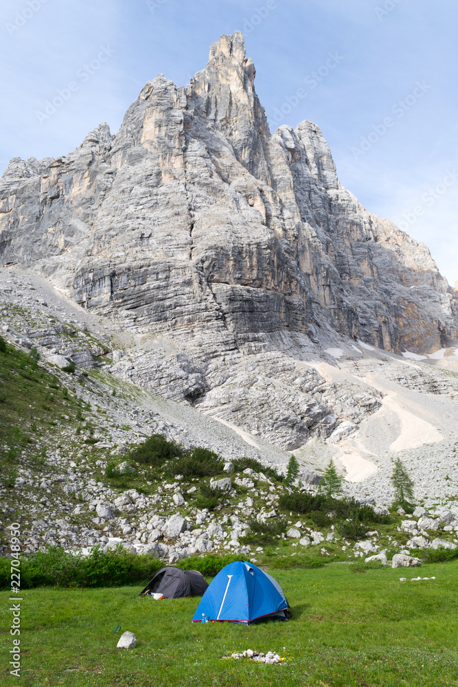 A wonderful place to pitch a tent. The Sorapiss lake in the Dolomites, a part of the Italian Alps, seems to come out of a fairy tale for the bright blue of its water and for the incredible mountains 