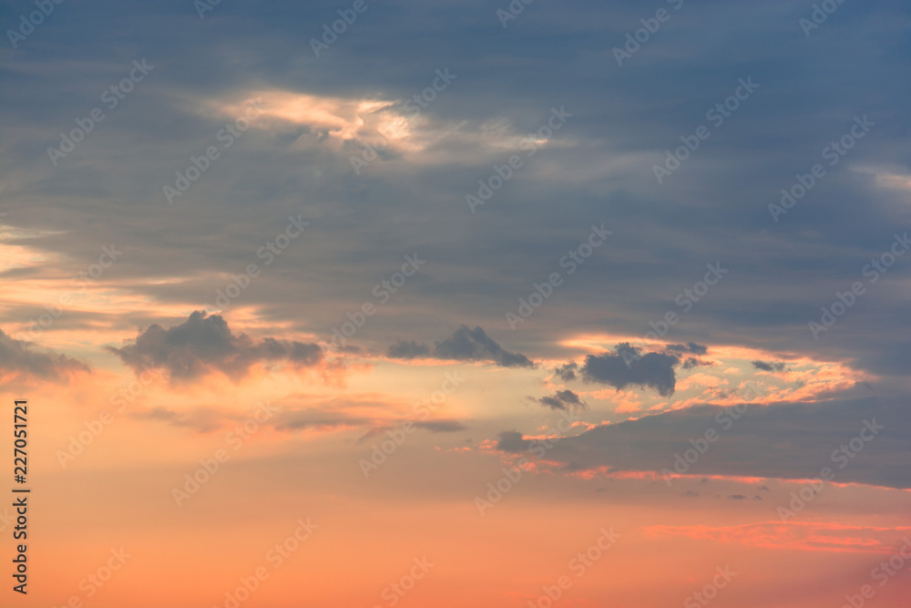 Colorful clouds on dramatic sunset sky