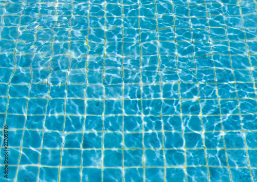 surface of blue swimming pool,background of water in swimming pool.