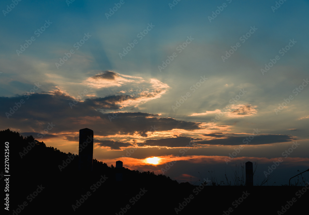 Cloudy and sunset with shadow of bumper pillars Cloudy and sunset with shadow of bumper pillars
