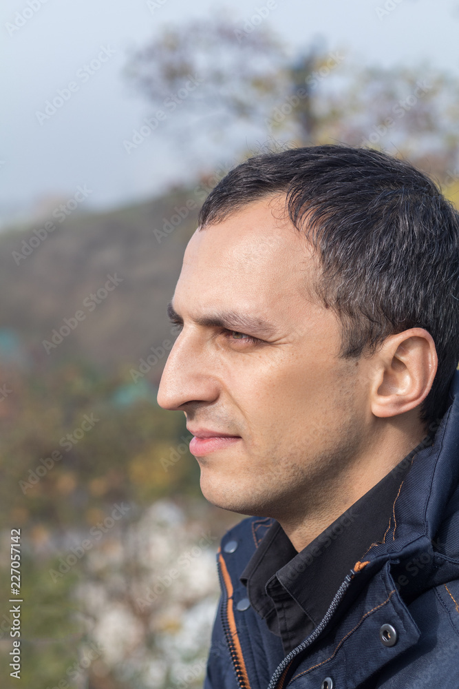 Handsome man in the autumn park Handsome man in the autumn park