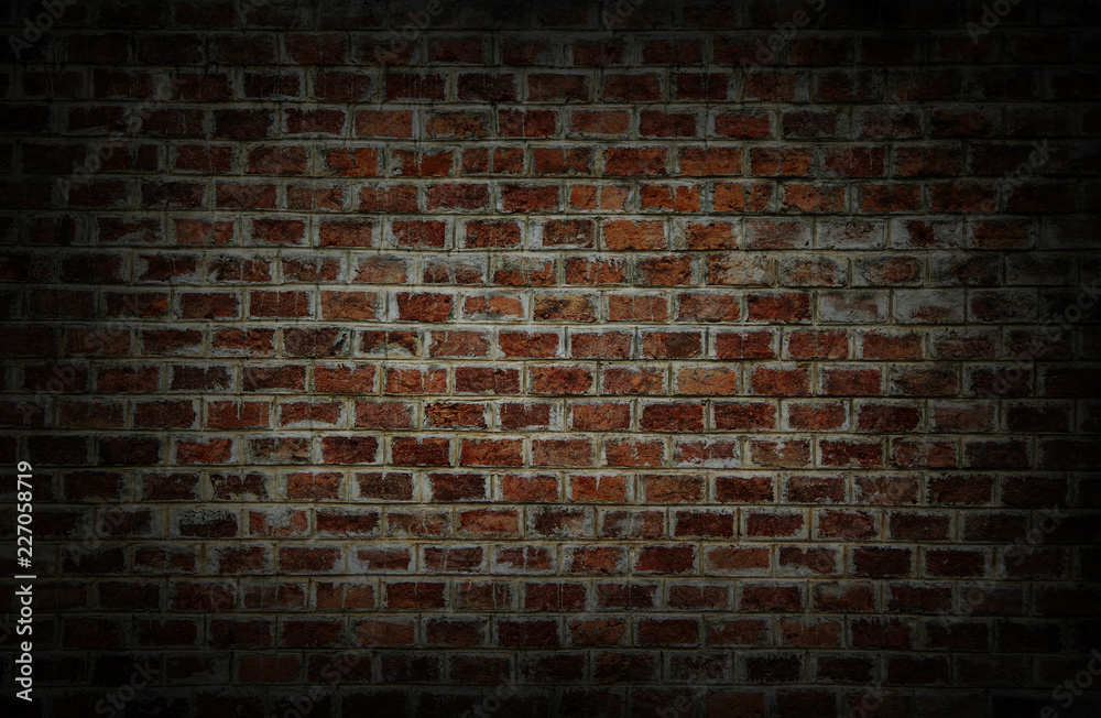 Background and Wallpaper or texture which has dim light of dark discolored  old brick wall ancient vintage retro style have damage and cracks. Stock  Photo | Adobe Stock