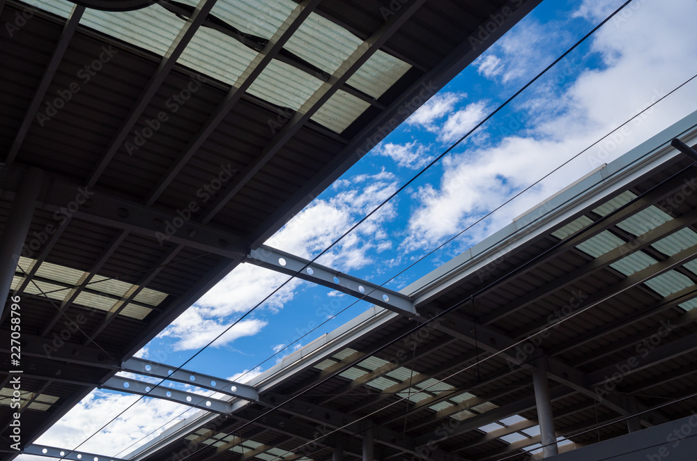 Blue crystal clear sky at train station platform Blue crystal clear sky at train station platform
