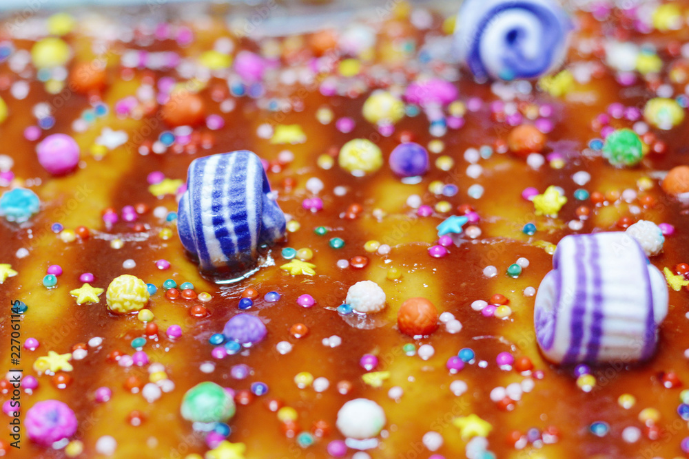 Turron - typical peruvian dessert decorated with a lot of candies. Turron - typical peruvian dessert decorated with a lot of candies.
