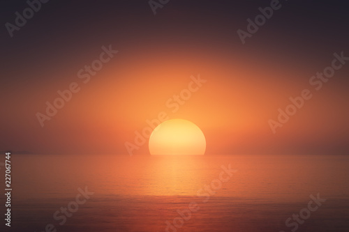 red sunset with big sun over the sea