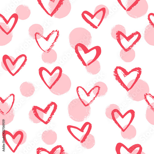 Doodle style brush drawn hearts and circles, dots seamless vector pattern, texture. Pink, red Valentines day background. Various hand drawn hearts and round shapes with rough, textured edge.