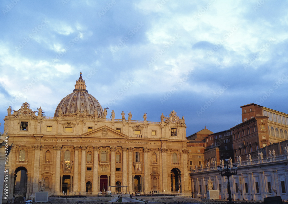the vatican building with rainy clouds above