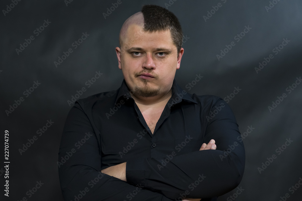 Punk as a subculture. Angry and displeased facial expression. Punk as a subculture. Angry and displeased facial expression.