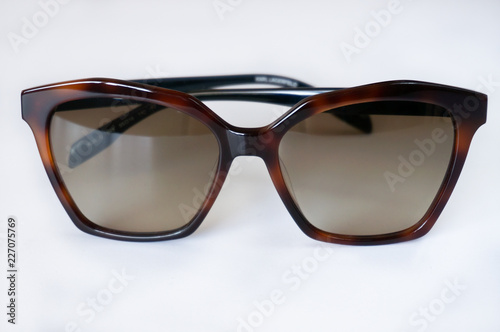 Brown unisex sunglasses on white background