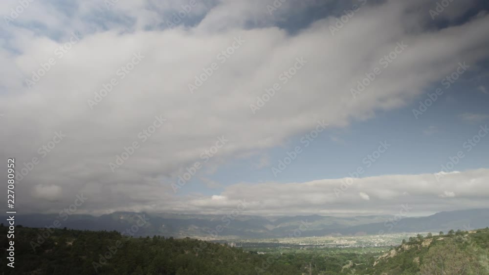 Clouds over Colorado mountains and valley Clouds over Colorado mountains and valley