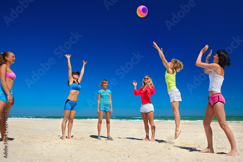 Giirls playing volleyball
