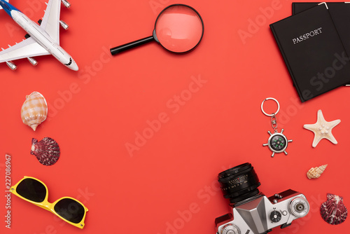 Summer Travel accessories on red background