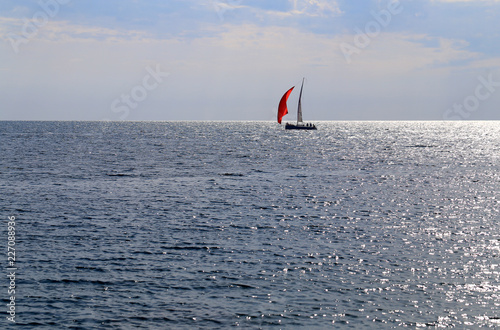 Photo of the sea bright beautiful landscape with waves and a boat