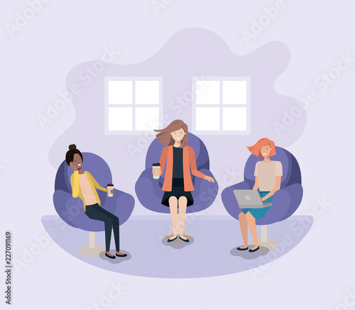 group of women in living room using technology