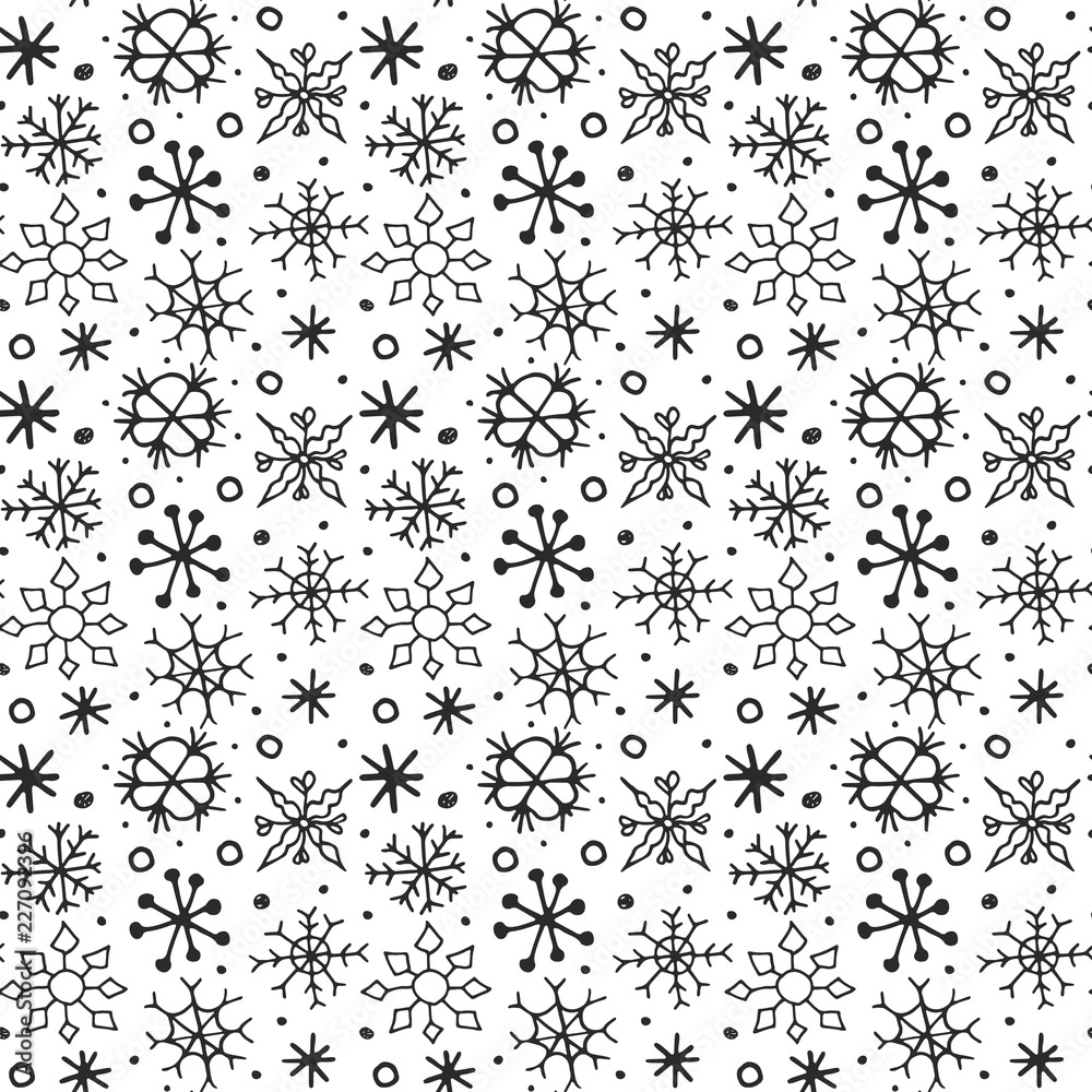 Seamless pattern with hand drawn sketch snowflakes.