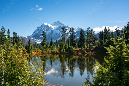 Autumn landscape of snow mountain and lake in Mt. Baker Hwy, Deming, USA
