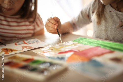 Children paint, brushes and paints close-up