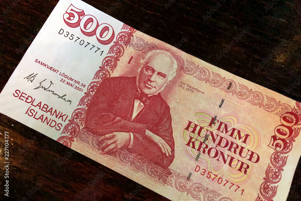 Icelandic cash. Money of Iceland. 500 Icelandic krona bill on wooden table. Icelandic  krona is the national currency of Iceland (kronur) Stock Photo | Adobe Stock