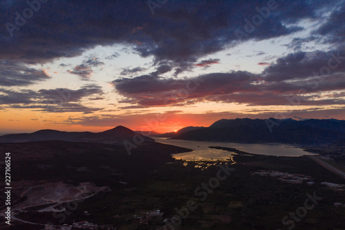 aerial view of sunset over tivat in kotor bay © phpetrunina14