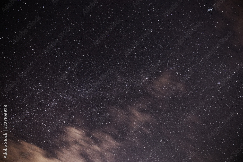 Fototapeta premium Starry sky with cloud clouds