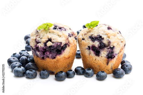 Delicious  blueberry muffins isolated on white