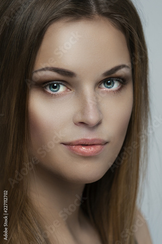 Portrait of a beautiful young woman close-up