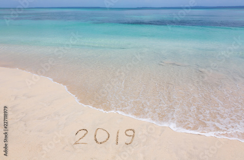 Happy New Year 2019 creative on the beach