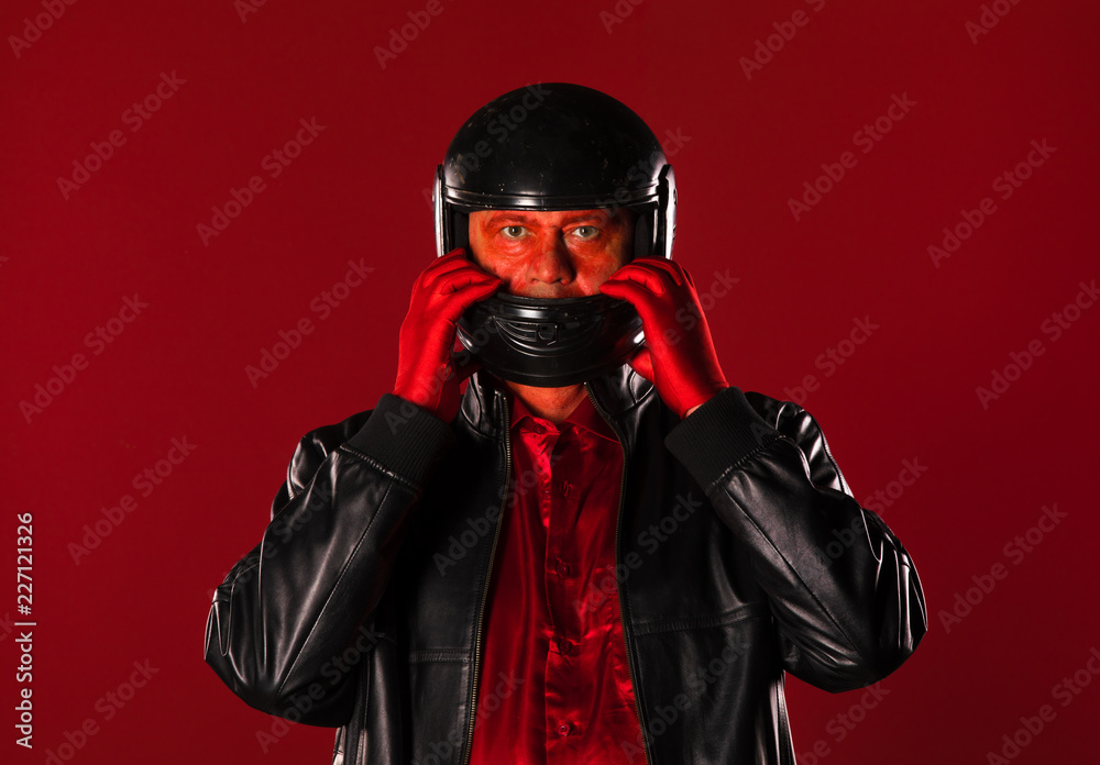 biker portrait on red background