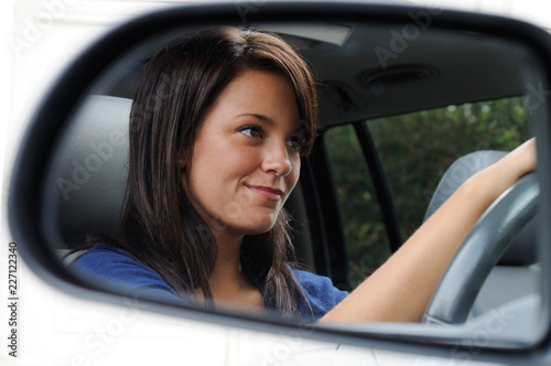 Young Woman Driving Her Car