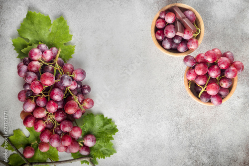 Grapes on stone background. Top view with space for your text