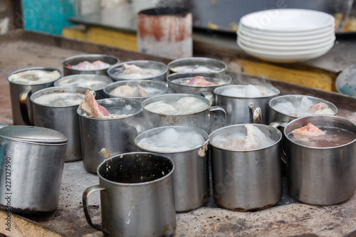 Boiling pots with lamb meat, captured at Kashgar, Xinjiang photo