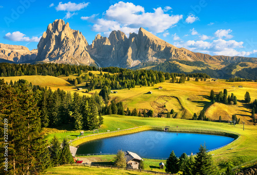 Lake and mountains, Alpe di Siusi or Seiser Alm, Dolomites Alps, Italy. photo