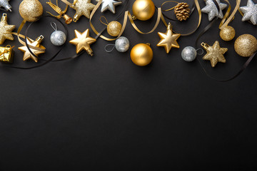 Golden silver christmas deco on black