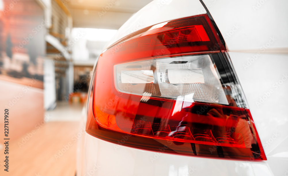 The rear lights of a modern prestigious car from a close angle