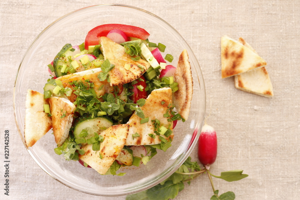 Fattush salad with pita pieces and radishes Fattush salad with pita pieces and radishes