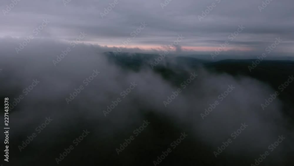 4K. Aerial wiev. Flight in mountains through clouds. 4K. Aerial wiev. Flight in mountains through clouds.