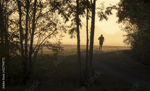 Man jogger at sunrise