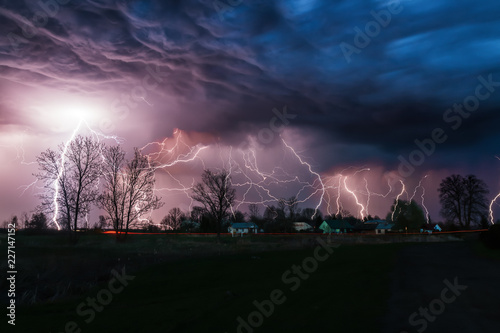 Large thunderstorm over a small village © pav1007