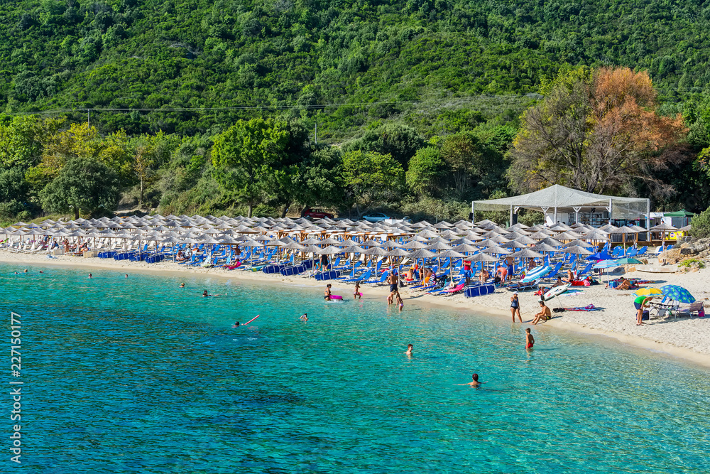 Naklejka premium Olympiada, Greece - August 18, 2018: Proti Ammoudia beach, one of the most beautiful beaches in the Aegean Sea.