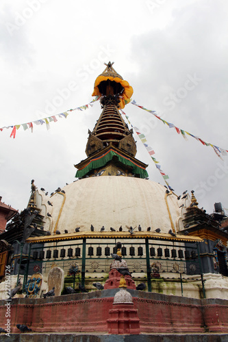 One quiet stupa (and its eyes) in the middle of Kathmandu local market.