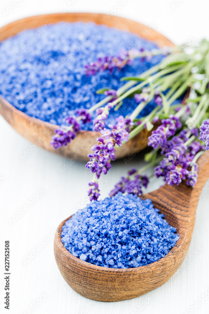Essential lavender salt with flowers top view.