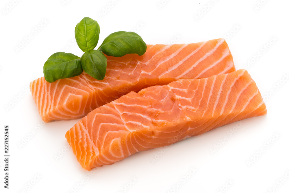 Fresh salmon fillet with basil on the white background. Fresh salmon fillet with basil on the white background.