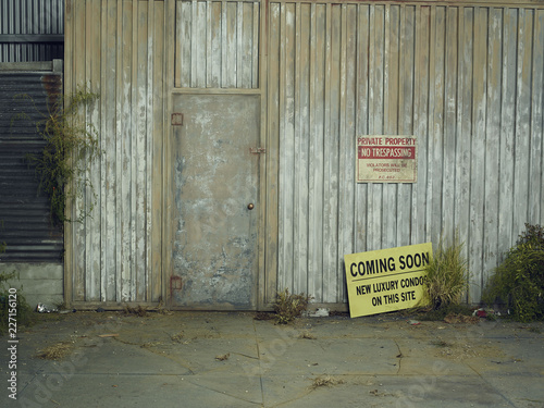 No trespassing sign on old warehouse