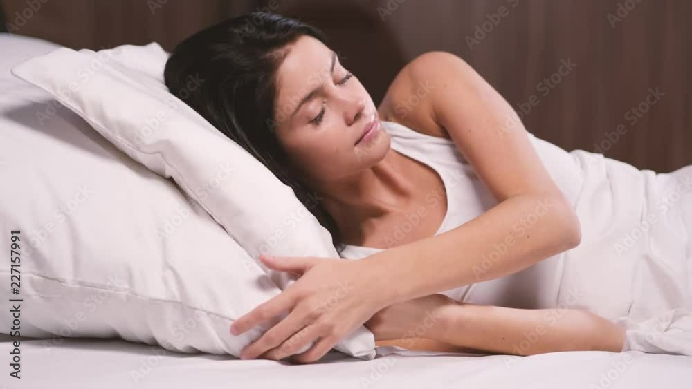 Attractive young girl at home. Sleeping in her bed Attractive young girl at home. Sleeping in her bed