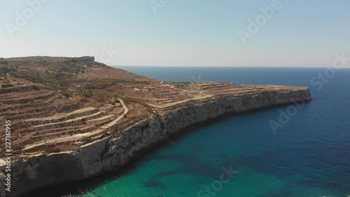 Aerial drone video from western Malta, Mgarr area, Fomm ir-Rih bay. photo