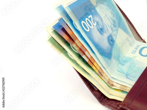 Israeli money in a purse