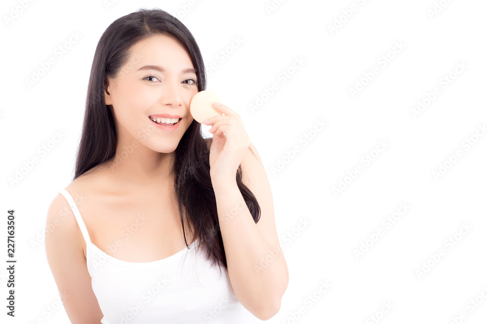 Portrait of beautiful asian woman applying powder puff at cheek makeup of cosmetic, beauty of girl with face smile isolated on white background, wellness and healthcare concept. Portrait of beautiful asian woman applying powder puff at cheek makeup of cosmetic, beauty of girl with face smile isolated on white background, wellness and healthcare concept.